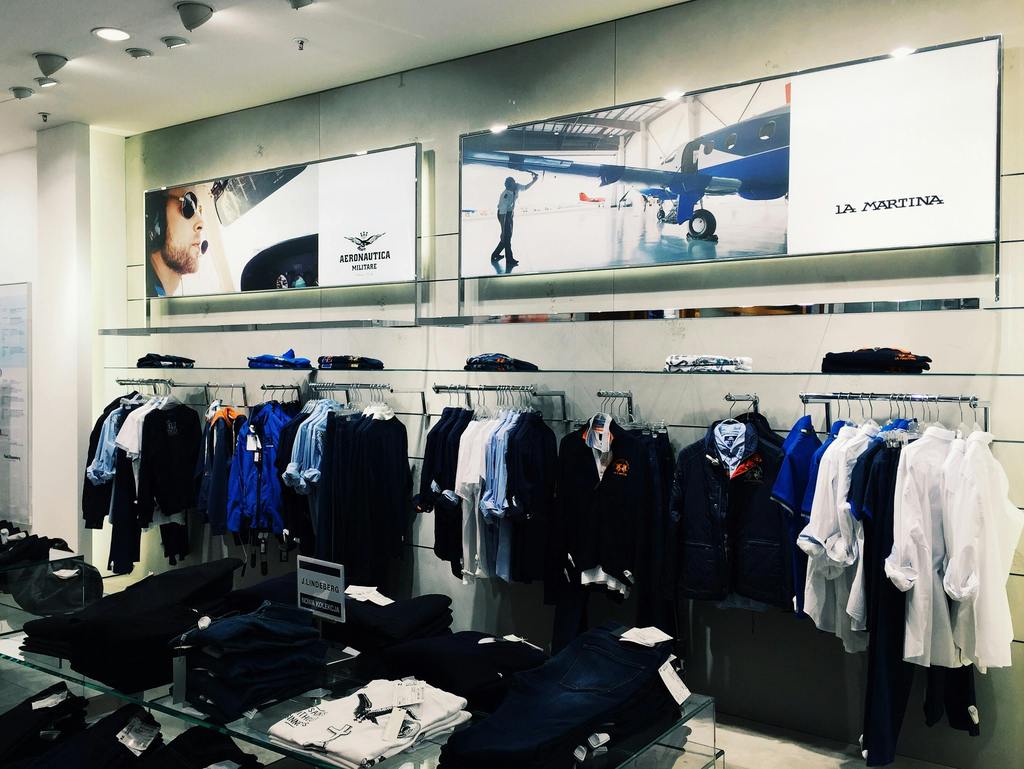 clothes hanging in retail shop